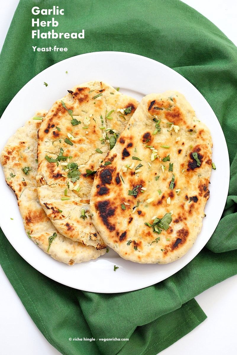 Garlic flatbread recipe No Yeast. This easy garlic herb flatbread has no yeast, doesn't need hours to rest, and has a secret ingredient. | VeganRicha.com #vegan #flatbread #recipe #yeastfree
