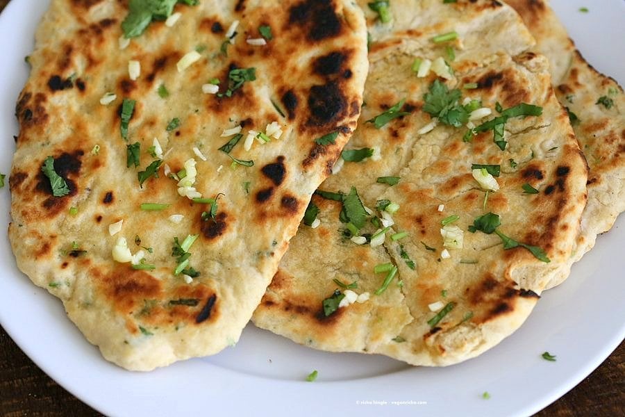 Garlic flatbread recipe No Yeast. This easy garlic herb flatbread has no yeast, doesn't need hours to rest, and has a secret ingredient. | VeganRicha.com #vegan #flatbread #recipe