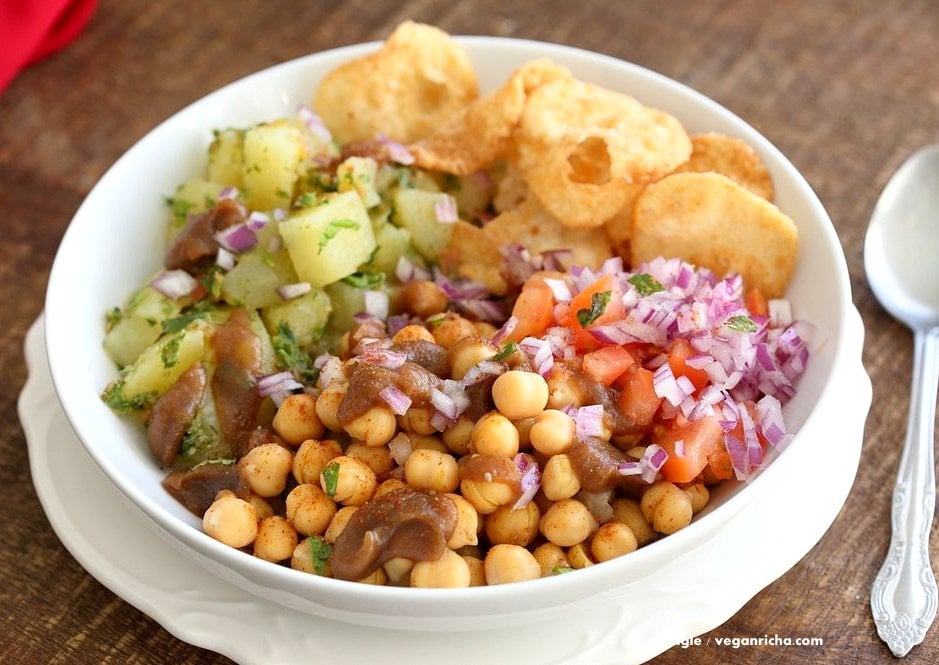 Chickpea Aloo Chaat Bowl. Mint cilantro Potatoes, spiced chickpeas, tamarind date chutney bowl with onions, tomatoes and chaat masala. | VeganRicha.com #vegan #glutenfree #soyfree #nutfree #bowl #recipe