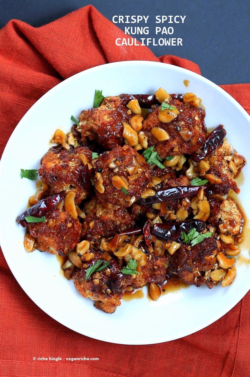 Crispy Kung Pao Cauliflower. Cauliflower battered and baked and tossed in spicy kung pao sauce. | VeganRicha.com #vegan #appetizer #snack #cauliflower #kungpao #recipe