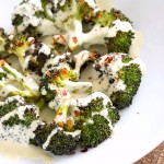 Roasted Broccoli with Creamy Basil Dressing. Broccoli tossed in garlic, cayenne, and baked. Served with cheesy cashew basil sauce. Vegan Gluten-free soy-free Recipe | VeganRicha.com #glutenfree #veganricha #vegan