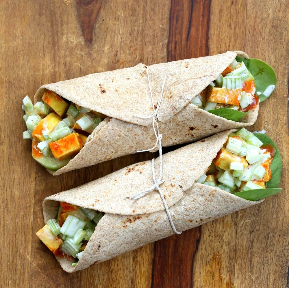 Buffalo Tofu wrap with Chickpea Tofu. Soy-free Chickpea flour Tofu tossed in buffalo hot sauce, layered with celery, spinach, cucumbers and vegan ranch. #vegan #glutenfree #soyfree #Easy weekday meal #Recipe | VeganRicha.com