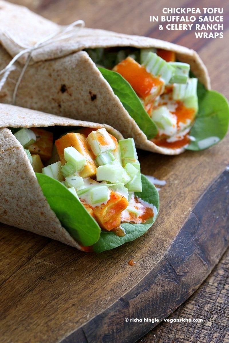 Buffalo Tofu wrap with Chickpea Tofu. Soy-free Chickpea flour Tofu tossed in buffalo hot sauce, layered with celery, spinach, cucumbers and vegan ranch. Easy weekday meal Recipe | VeganRicha.com