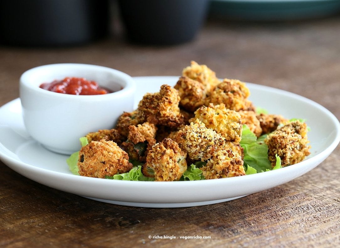 Baked Popcorn Okra. Okra /bhindi tossed in chickpea flour batter, coated in spiced breadcrumbs and baked until crunchy crisp. Vegan Recipe, can be gluten-free | VeganRicha.com
