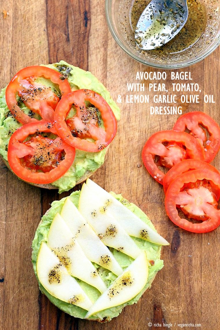 Avocado Bagels with Pears and Tomatoes and Mediterranean Oregano Garlic Olive Oil Dressing Bagel Avocado Toast. Easy Vegan Snack or Breakfast. | VeganRicha.com