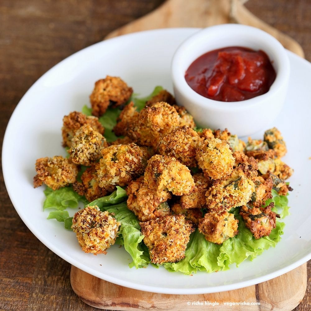 Baked Popcorn Okra. Okra /bhindi tossed in chickpea flour slurry, coated in spiced breadcrumbs and baked until crunchy crisp. Vegan Recipe, can be gluten-free | VeganRicha.com