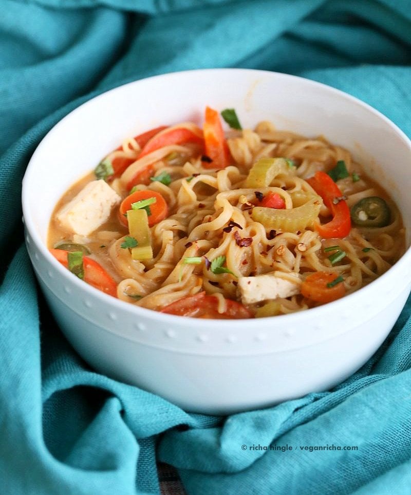 One pot peanut sauce noodles, Ready in 20 minutes! Brown Rice Noodles, Veggies, Peanut or Almond Butter, spices, flavors, boil and done. Easy Quick Weeknight Dinner Recipe | VeganRicha.com