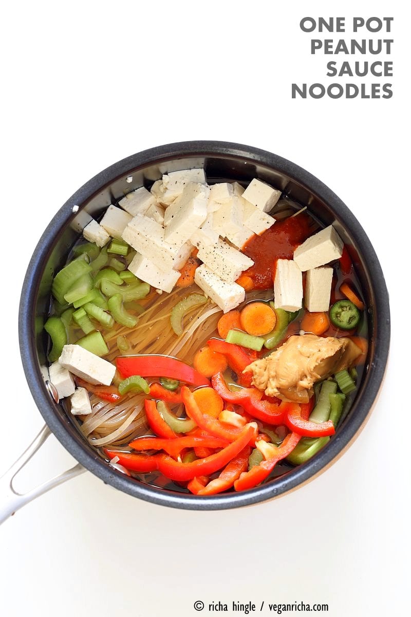 One Pot Peanut Sauce Noodles, Ready in 20 minutes! Brown Rice Noodles, Veggies, Peanut or Almond Butter, spices, flavors, boil and done. Easy Quick Weeknight Dinner Recipe | VeganRicha.com