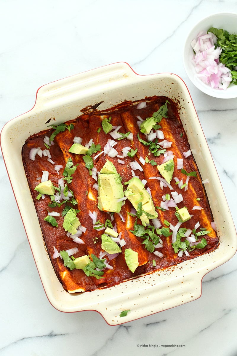 Vegan Enchiladas Recipe. Easy Enchilada Recipe with Blender Enchilada Sauce, soft tortillas filled with Black beans and Lentils. Vegan Soy-free Recipe. Can be Gluten-free. Ready within 1 Hour. | VeganRicha.com