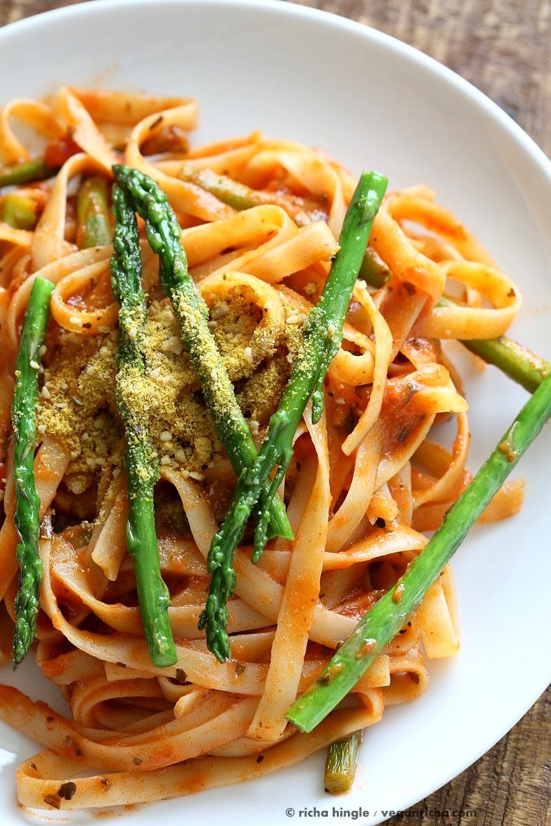 Fettuccine with Tomato Cream Sauce and Asparagus. Easy tomato Cream sauce with pasta and garlic roasted Asparagus. Use other veggies of choice. Add some chickpea chorizo or smoked coconut for variation. Vegan Soyfree Recipe. Can be gluten-free with gf pasta. | VeganRicha.com