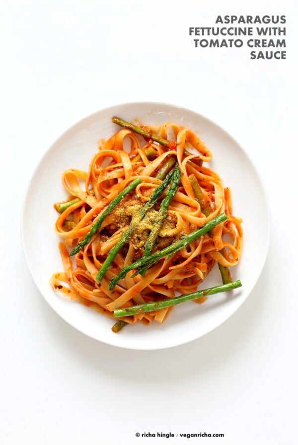 Fettuccine with Tomato Cream Sauce and Asparagus. Easy tomato Cream sauce with pasta and garlic roasted Asparagus. Use other veggies of choice. Add some chickpea chorizo or smoked coconut for variation. Vegan Soyfree Recipe. Can be gluten-free with gf pasta. | VeganRicha.com #vegan #glutenfree #veganricha