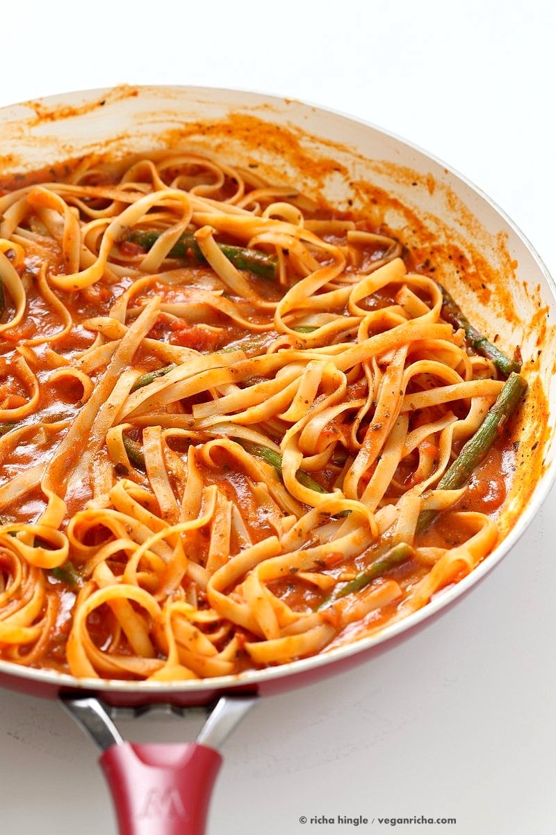 Fettuccine with Tomato Cream Sauce and Asparagus. Easy tomato Cream sauce with pasta and garlic roasted Asparagus. Use other veggies of choice. Add some chickpea chorizo or smoked coconut for variation. Vegan Soyfree Recipe. Can be gluten-free with gf pasta. | VeganRicha.com