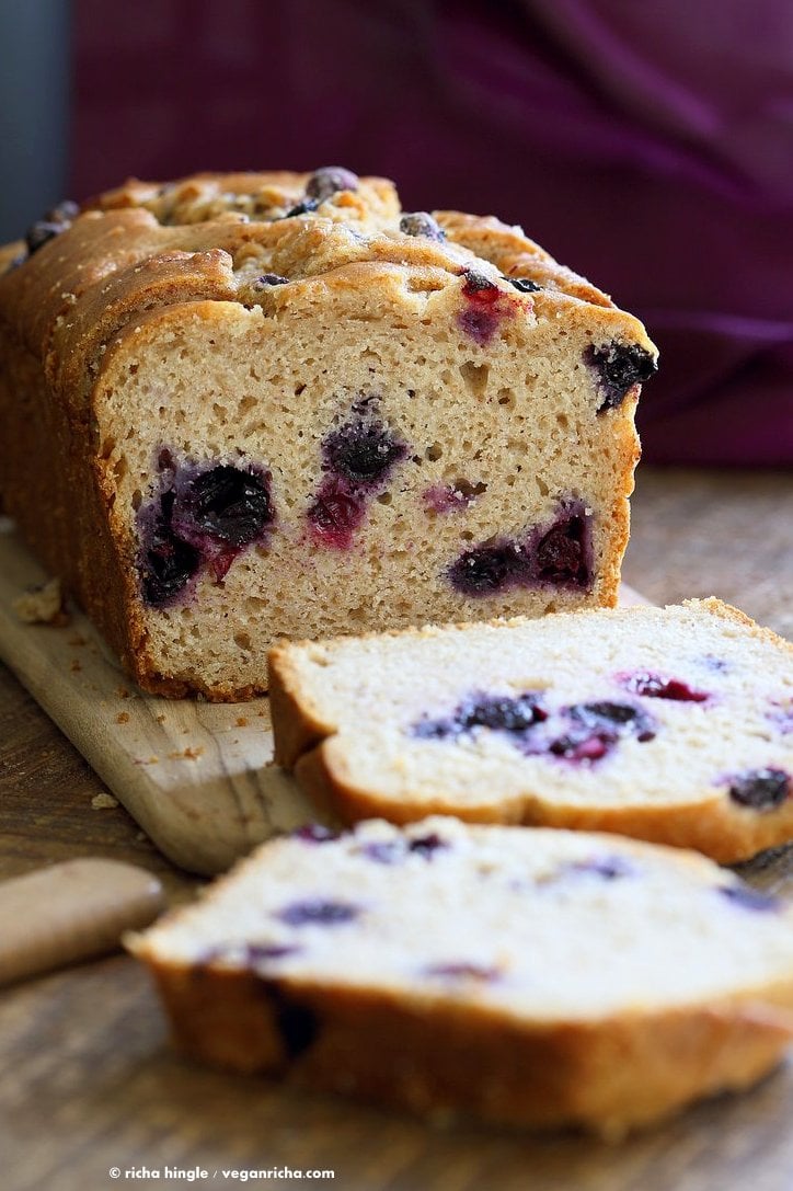 Vegan Lemon Blueberry Cake. This zesty Blueberry Lemon Pound Cake is dense and full of flavor. Use other berries in this Vegan Pound Cake Recipe. Non Dairy Yogurt Pound Cake Loaf with lemon and blueberries. 15 min prep and done. | VeganRicha.com