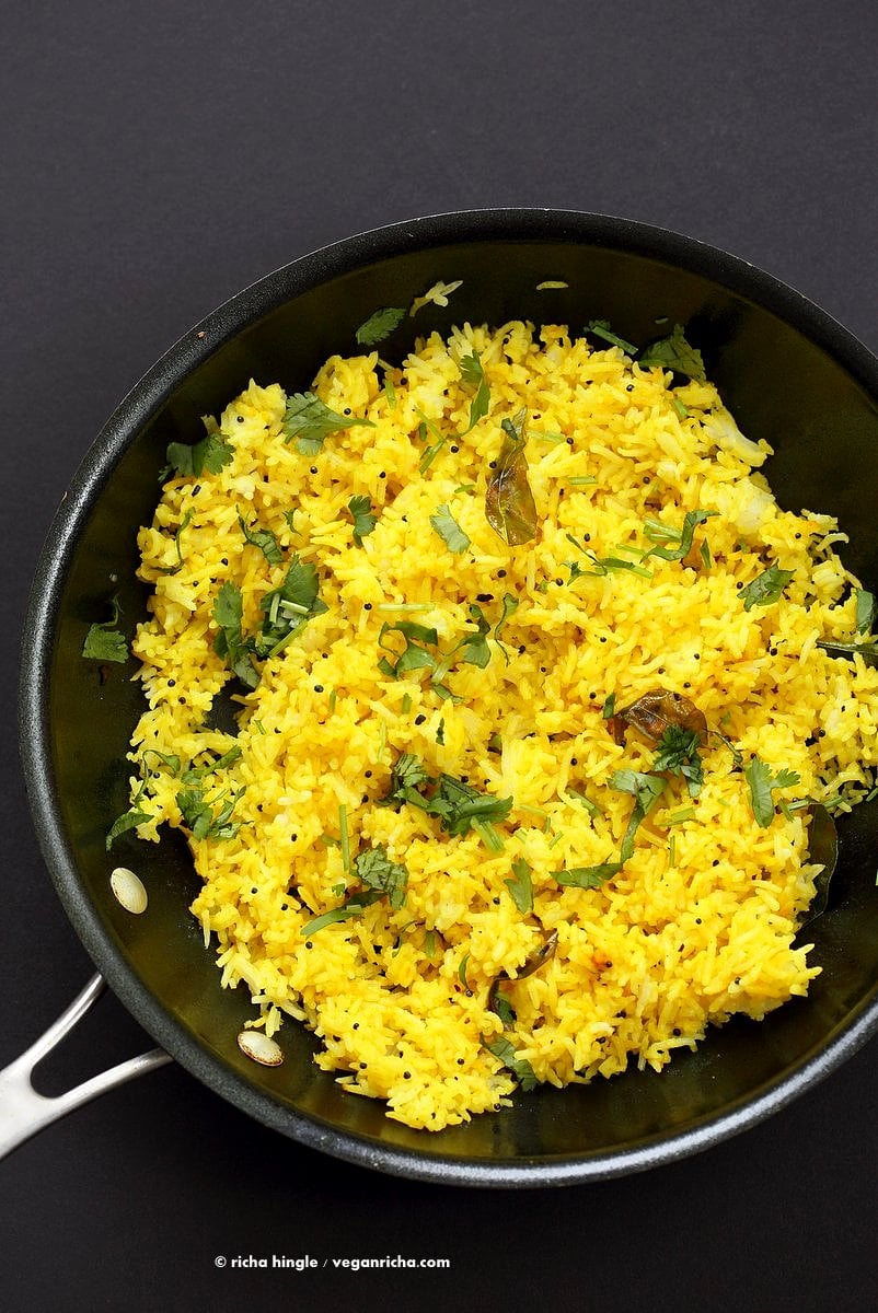 Turmeric Lemon Rice Recipe. Golden Rice with turmeric, lemon and mustard seeds. Use cooked brown rice, quinoa or millet or couscous for variation. Easy side. Vegan Gluten-free Soy-free Recipe | VeganRicha.com