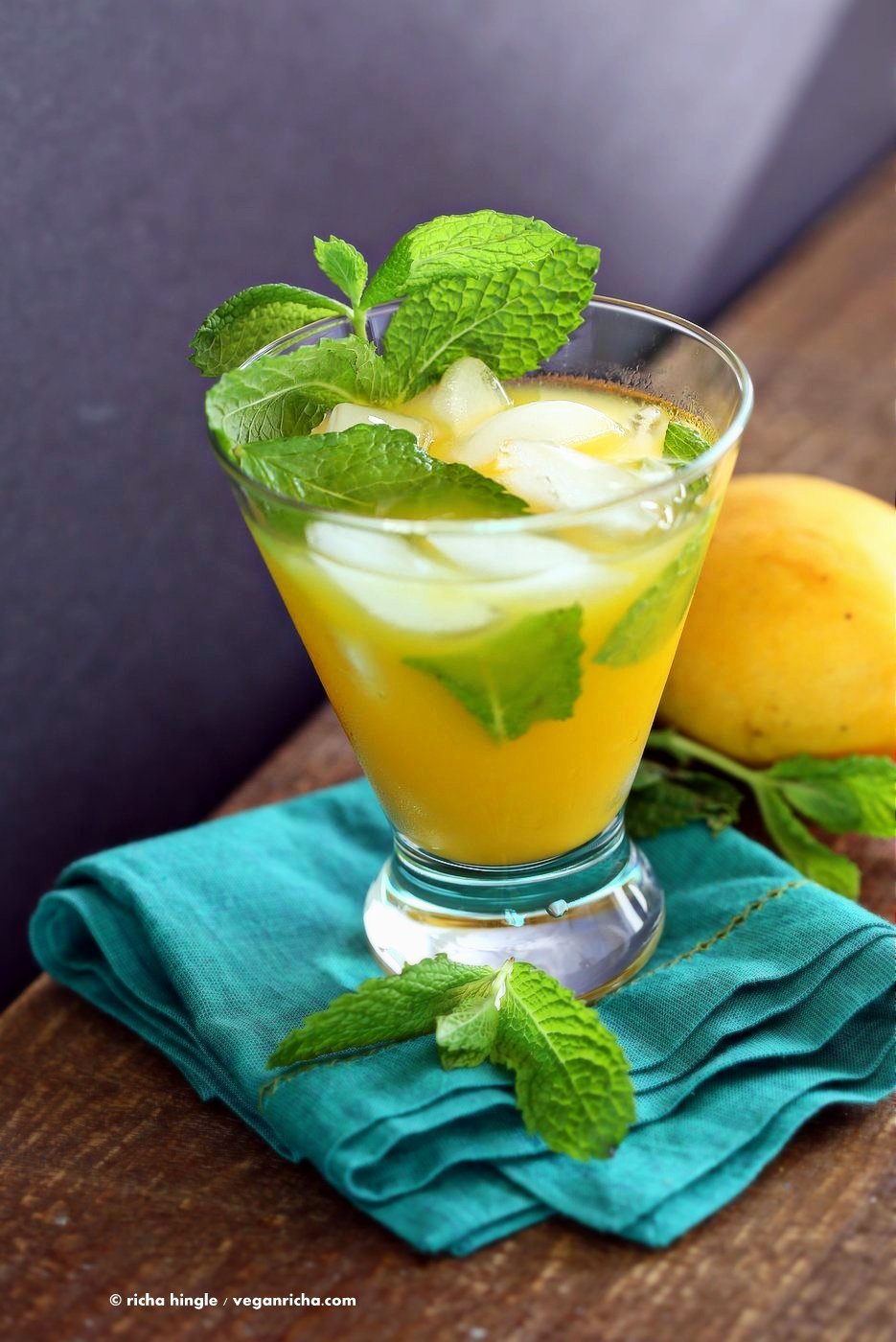 Easy Refreshing Mango Mojito Recipe. Make this mojito with or without the alcohol. Refreshing mint and lime and sweet Summery Mango make this a perfect drink for any outdoor event. Vegan Recipe | VeganRicha.com