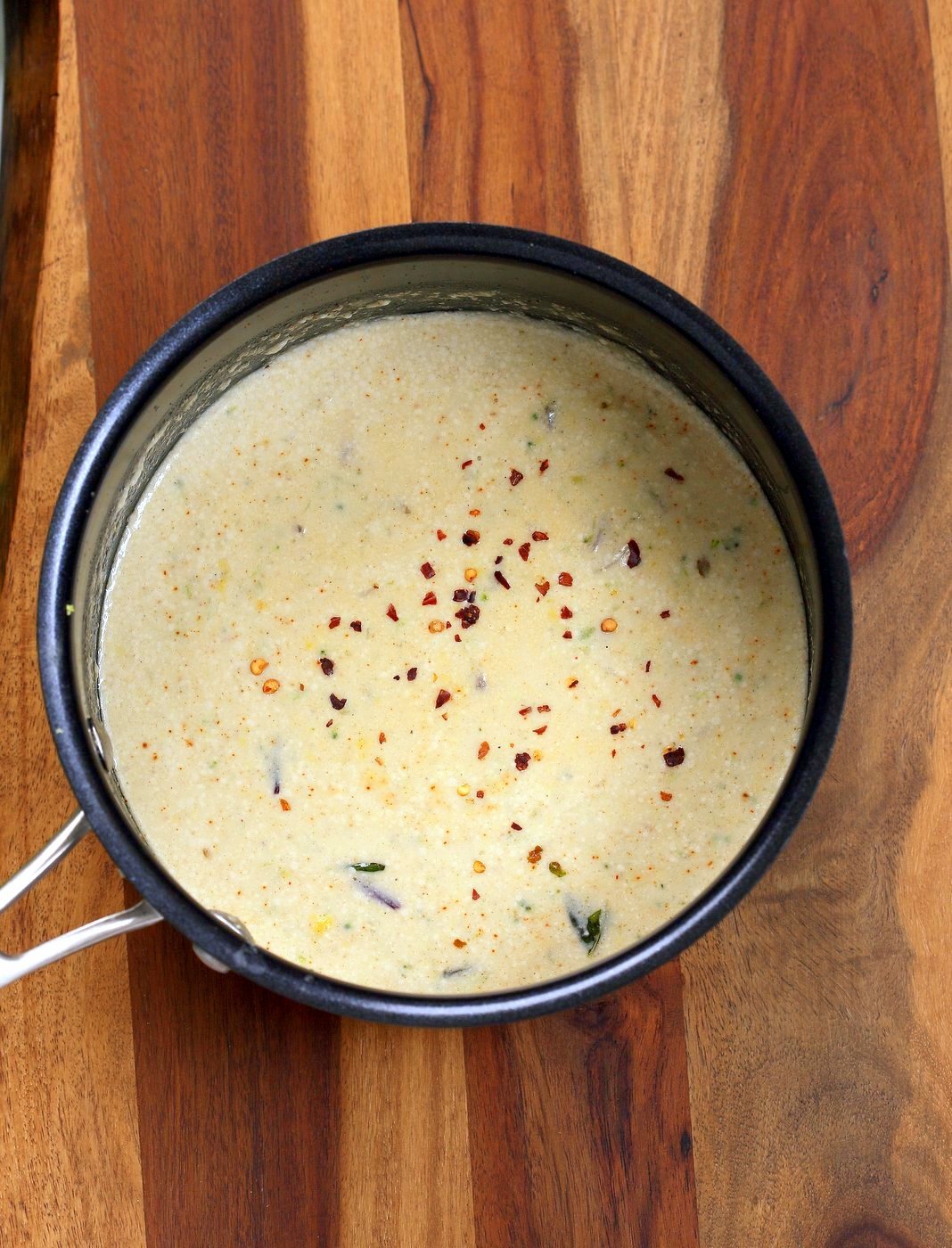 Easy Spiced Vegan Creamy Broccoli Soup. Shredded broccoli cooked with spices, basil and a creamy cashew sauce. #Vegan #Glutenfree #soup #Recipe. | VeganRicha.com