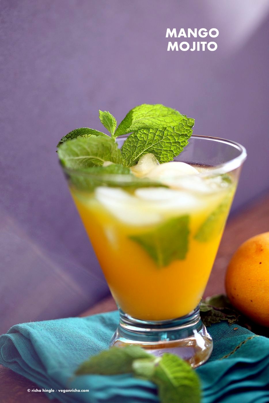 Easy Refreshing Mango Mojito Recipe. Make this mojito with or without the alcohol. Refreshing mint and lime and sweet Summery Mango make this a perfect drink for any outdoor event. Vegan Recipe | VeganRicha.com