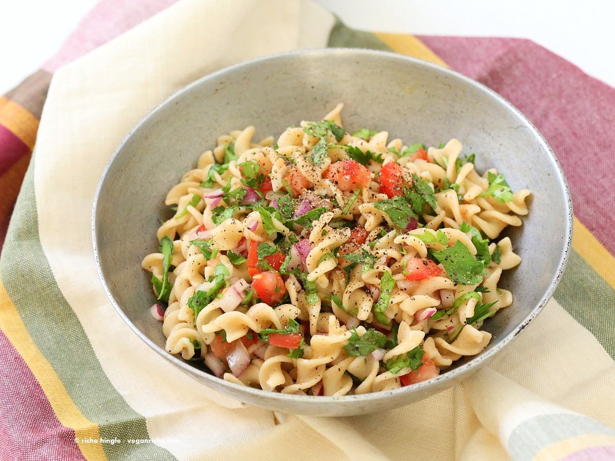 Tabbouleh Pasta Salad. Parsley, tomatoes, fusilli pasta dressed with olive oil, salt, pepper and lemon. Fresh Summer Salad. Vegan Soy-free Recipe. Can be made gluten-free with gf pasta. | VeganRicha.com