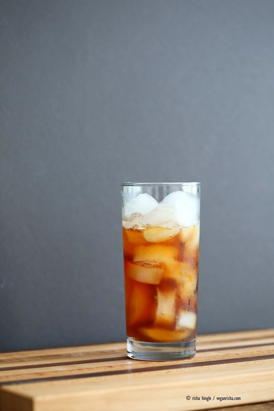 Cardamom Cinnamon Turmeric Iced Tea. Spiced Iced tea like Thai Iced tea with turmeric coconut milk and Indian masala chai spices and ginger. Golden Milk Iced Tea. Vegan Gluten-free Soy-free Recipe | VeganRicha.com