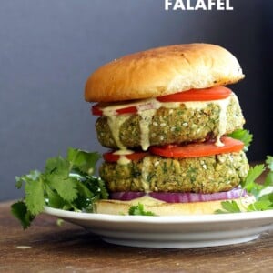 Easy Vegan Falafel Burger. Chickpea patties with tahini dressing and hummus make for a filling and flavorful burger. Vegan Soy-free Recipe. Can be made gluten-free | VeganRicha.com