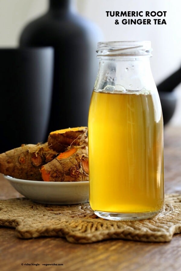 Ginger Turmeric Root Tea. Fresh Turmeric Root and ginger simmered with black pepper. Add sweetener of choice. Serve hot or chilled. Vegan Gluten-free Recipe | VeganRicha.com #glutenfree #veganricha #vegan