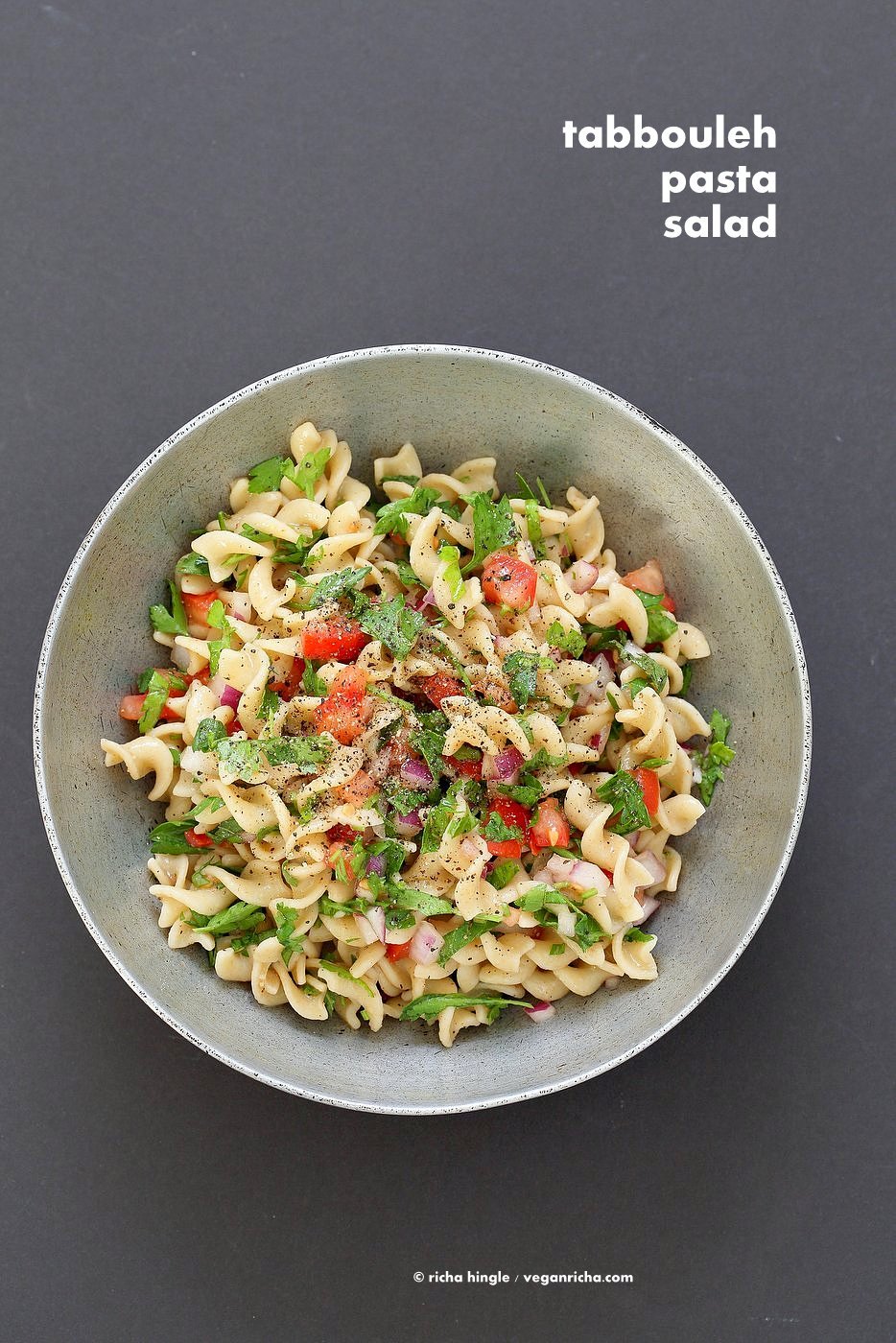 Tabbouleh Pasta Salad. Parsley, tomatoes, fusilli pasta dressed with olive oil, salt, pepper and lemon. Fresh Summer Salad. Vegan Soy-free Recipe. Can be made gluten-free with gf pasta. | VeganRicha.com