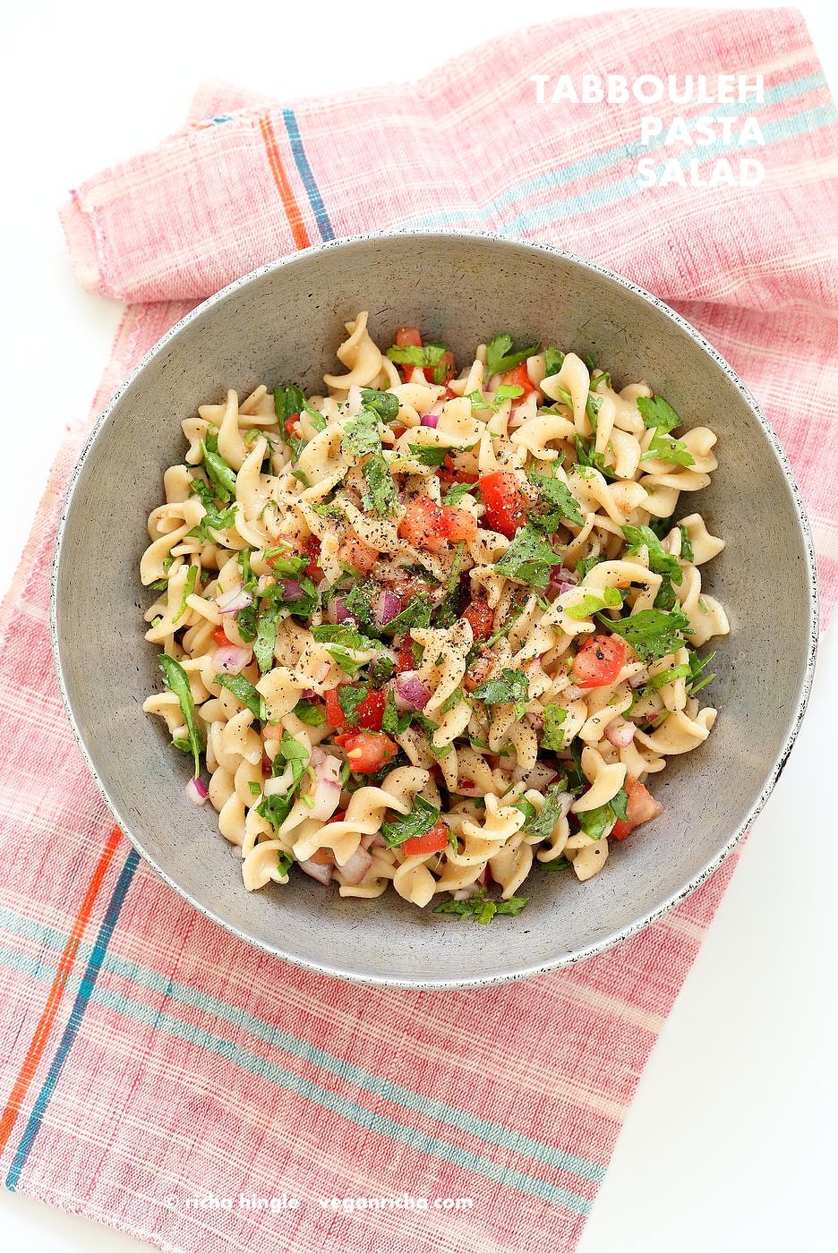 Tabbouleh Pasta Salad. Parsley, tomatoes, fusilli pasta dressed with olive oil, salt, pepper and lemon. Fresh Summer Salad. #Vegan #Soyfree Recipe. Can be made #glutenfree with gf pasta. | VeganRicha.com