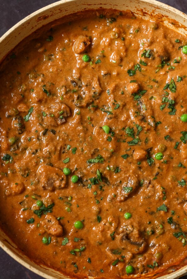 mushroom matar masala in the pan after cooking and adding garnish