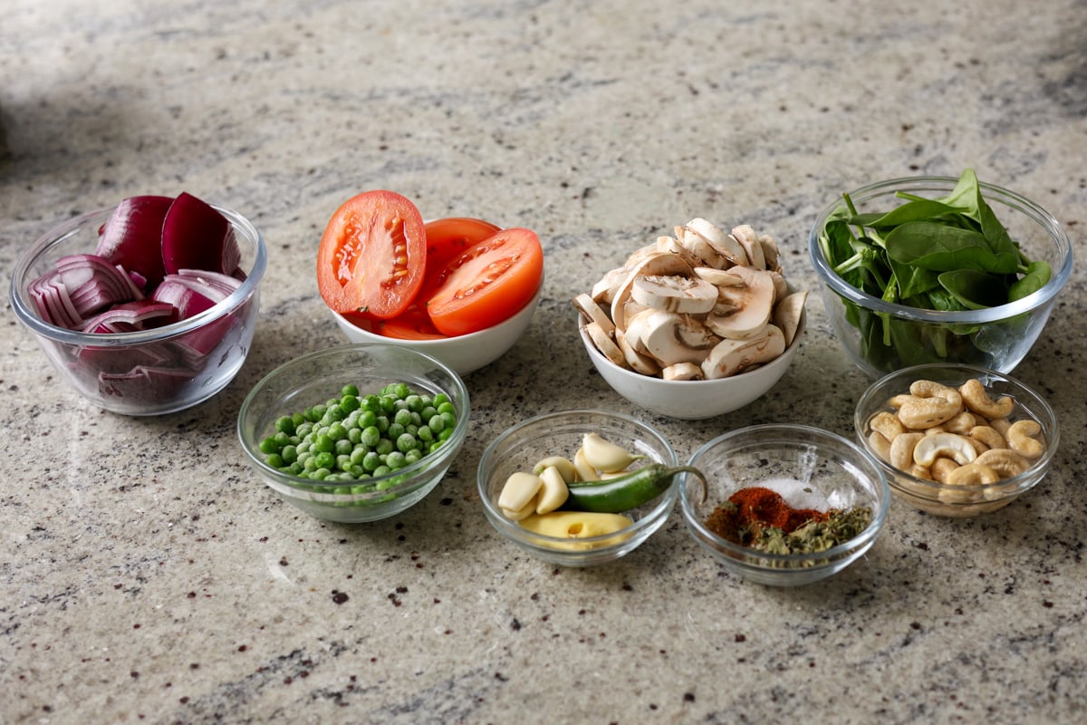 matar masala ingredients on a kitchen counter