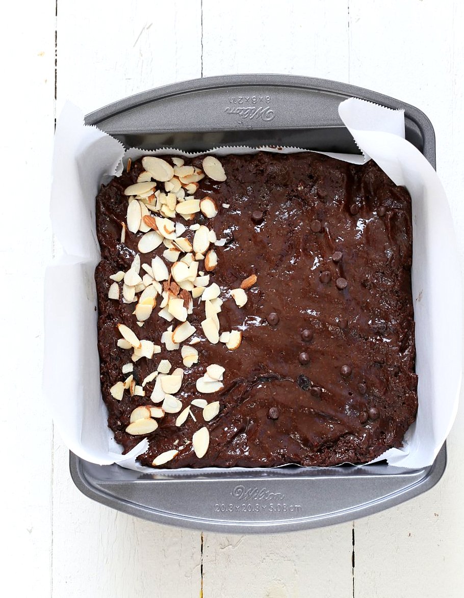 Double Blueberry Brownies. Summer Dark Chocolate Brownies with blueberries and almonds. Blueberries cooked to a compote in the wet and blueberries added with chocolate chips in the batter. Vegan Brownie Recipe. Easily made gluten-free | VeganRicha.com