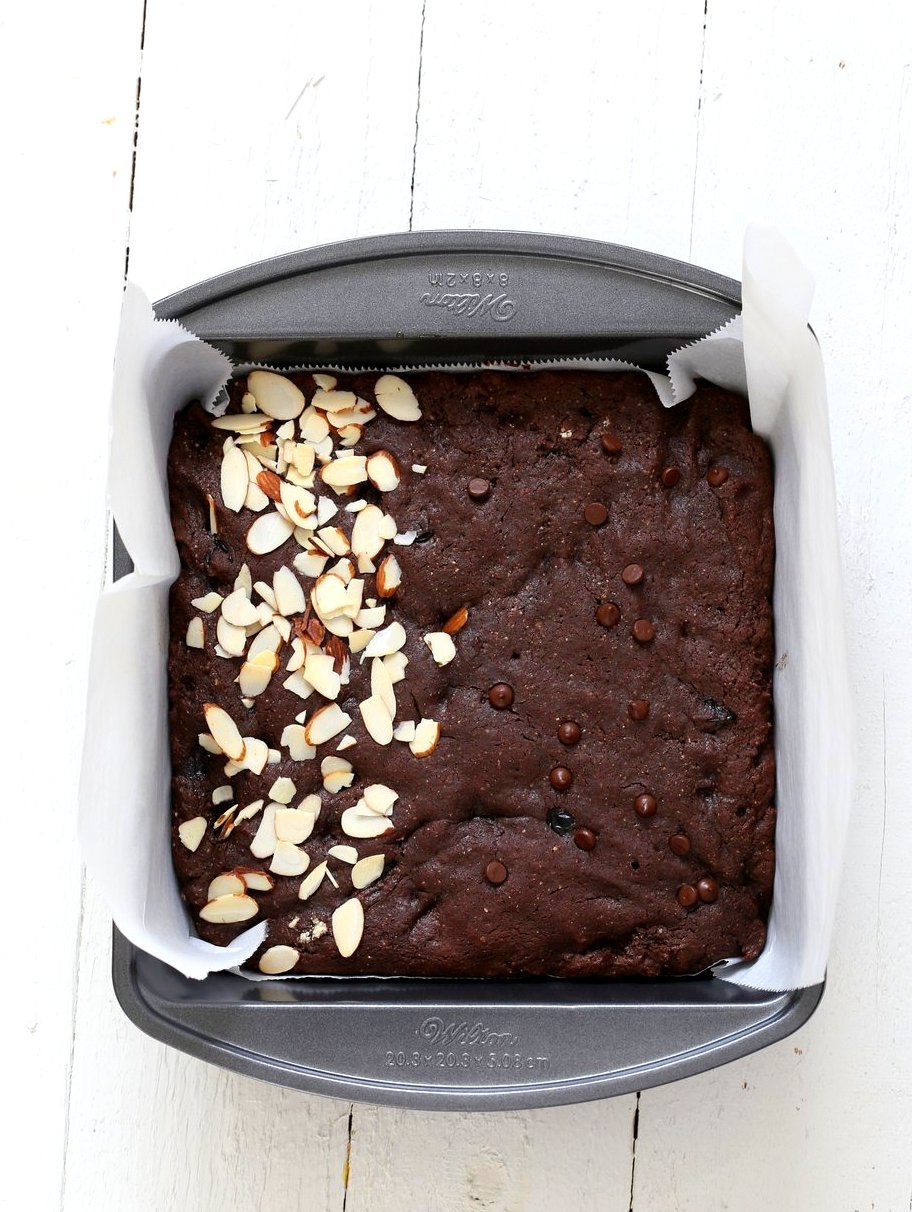Double Blueberry Brownies. Summer Dark Chocolate Brownies with blueberries and almonds. Blueberries cooked to a compote in the wet and blueberries added with chocolate chips in the batter. Vegan Brownie Recipe. Easily made gluten-free | VeganRicha.com