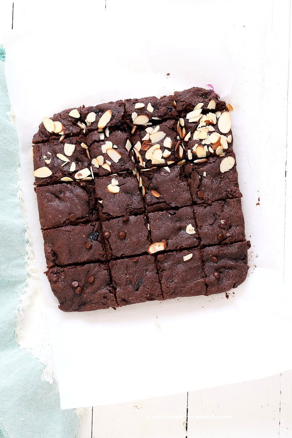 Double Blueberry Brownies. Summer Dark Chocolate Brownies with blueberries and almonds. Blueberries cooked to a compote in the wet and blueberries added with chocolate chips in the batter. Vegan Brownie Recipe. Easily made gluten-free | VeganRicha.com