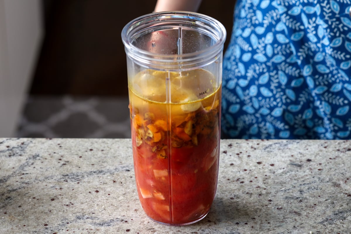 adding water to the food processor