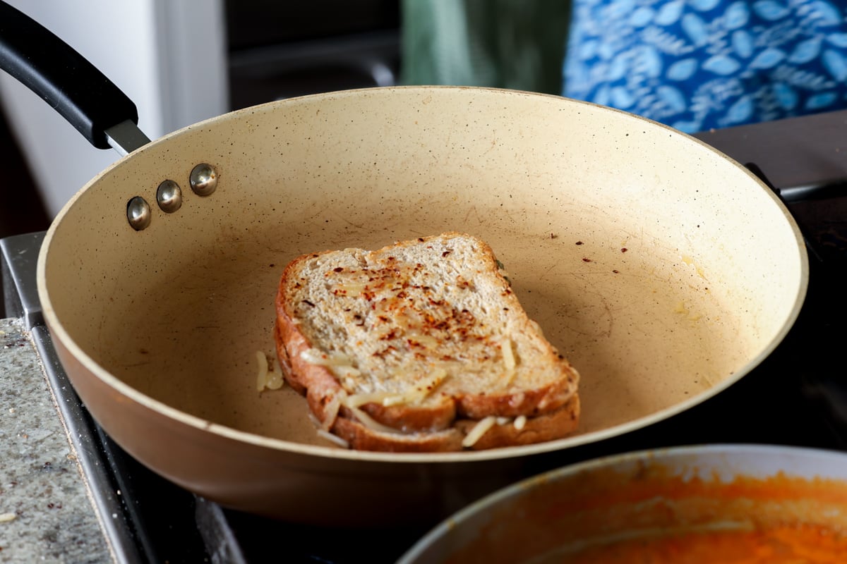 closing the vegan grilled cheese sandwich in the pan