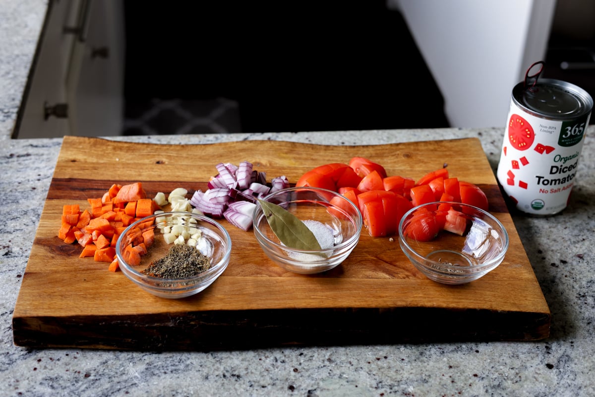 spiced tomato soup ingredients on the kitchen counter