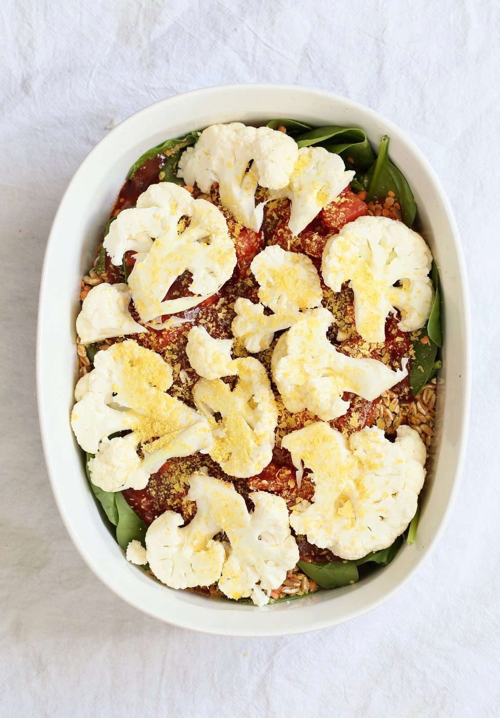 BBQ Lentil Farro Cauliflower Casserole. BBQ Casserole with Red Lentils, Farro, Veggies, Spinach, Cauliflower all layered and baked. Amazing Flavors! #Vegan #Glutenfree #Nutfree #Recipe. Can be soyfree #veganricha | VeganRicha.com