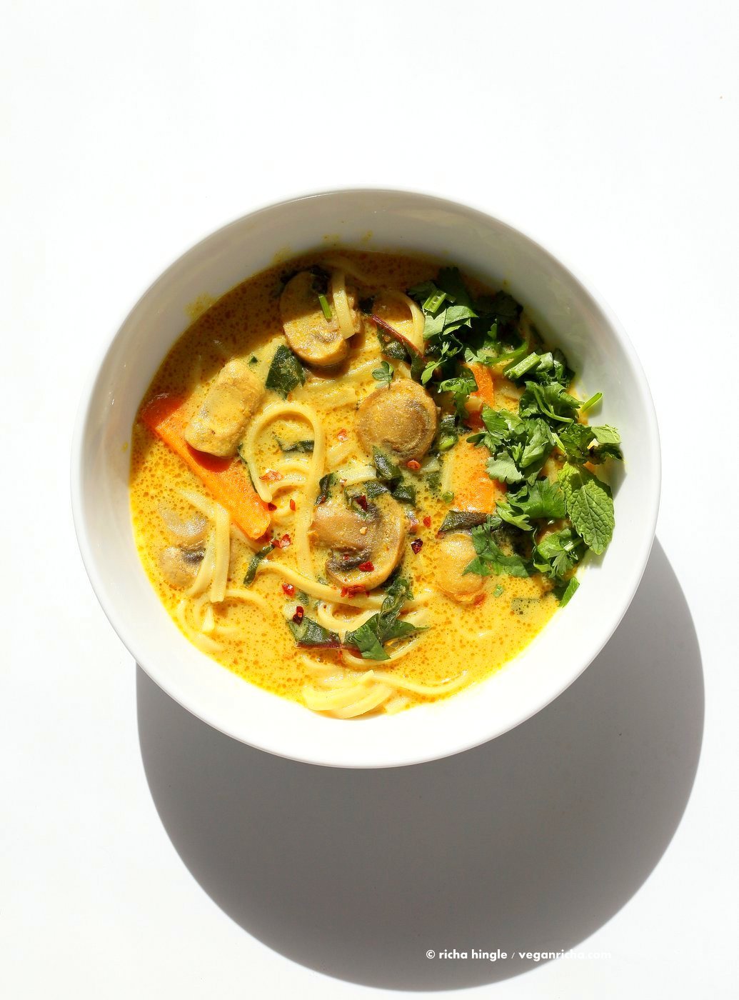 Vegan Laksa - Malaysian Curry Laksa Soup Recipe with homemade Laksa paste. Warming, spicy, flavorful soup for fall and winter. Vegan Gluten-free Soy-free Recipe | VeganRicha.com