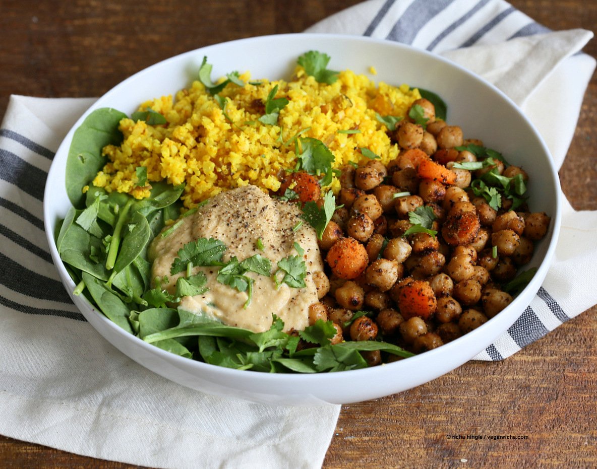 Turmeric Cauliflower Rice, Spiced Chickpeas or lentils, Black pepper hummus and Greens bowl. Amazing Flavors for any meal. Ready within 25 minutes. Vegan Gluten-free Soy-free Recipe | VeganRicha.com