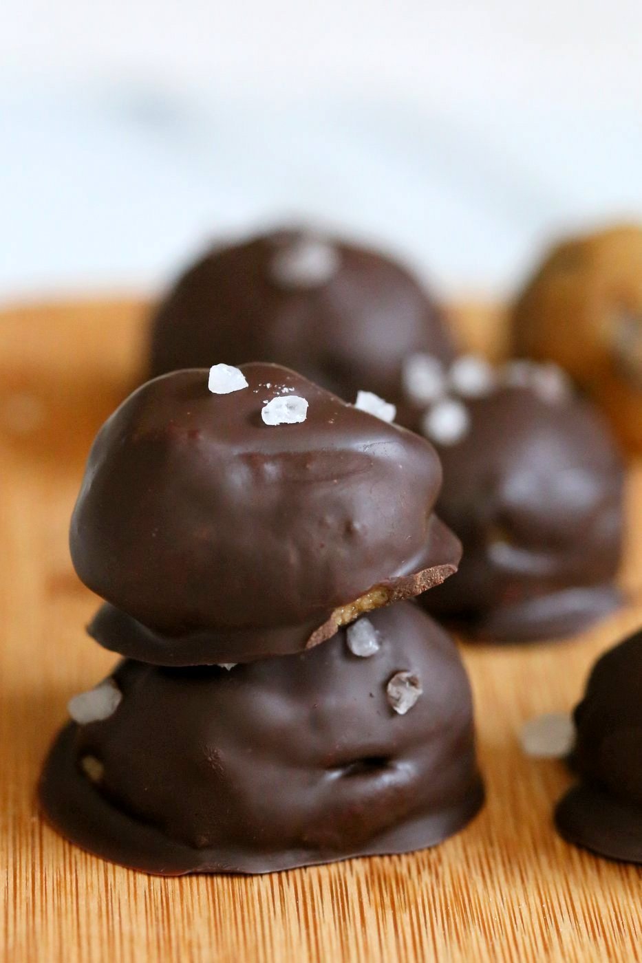 Cookie Dough Truffles. Fudgy Cookie dough coated in melted chocolate and topped with coarse sea salt. Vegan Gluten-free Recipe | VeganRicha.com