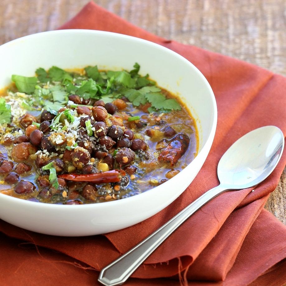 Kadala Curry - Bengal Gram or Kala Chana Curry with Coconut and Spices. Brown Chickpea Coconut Curry from South India (Kerala). Serve with rice, appams, dosas or make a bowl with roasted veggies and grains. #Vegan #Glutenfree #Soyfree #Indian #Recipe #veganricha | VeganRicha.com