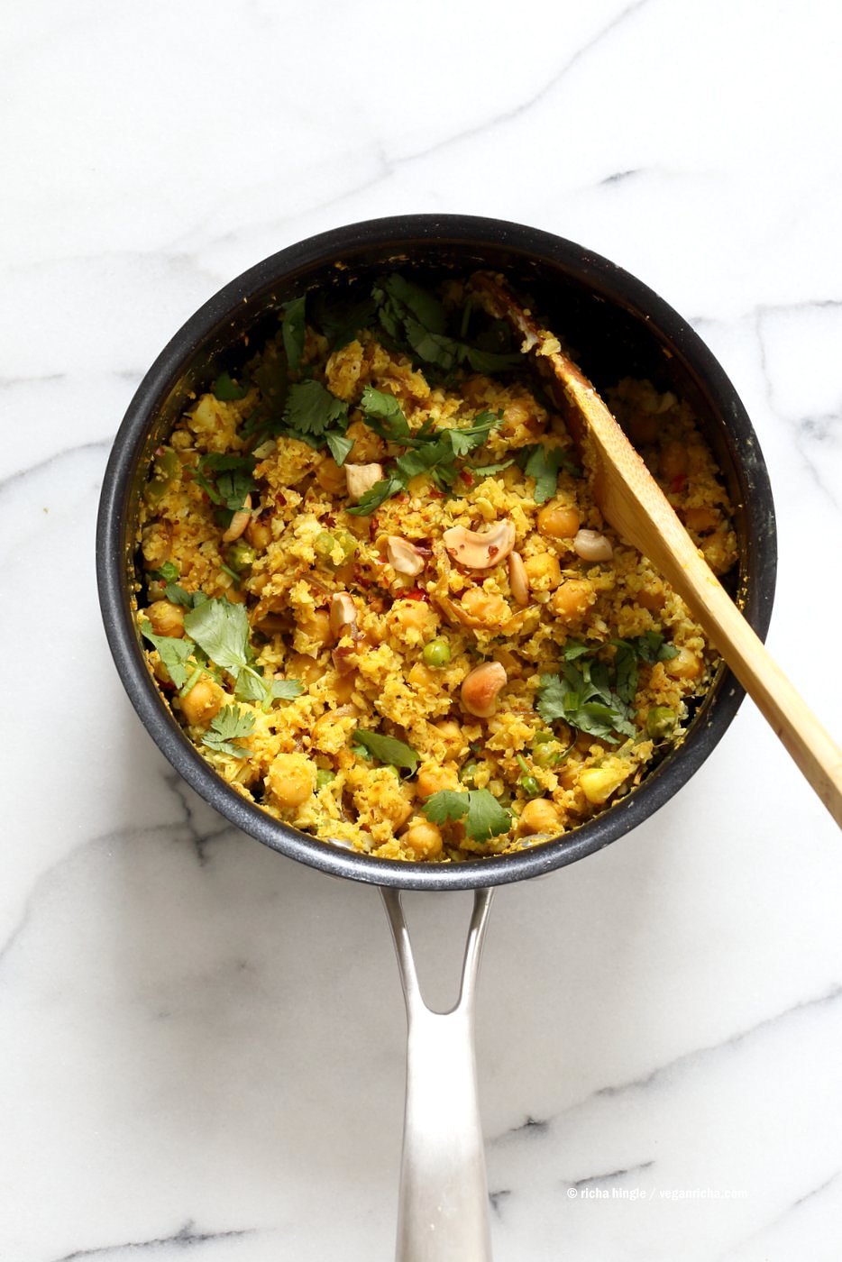 Chickpea Cauliflower Rice Biryani. 1 pot 30 Minute Meal with Veggies, Chickpeas, Spices, and Cauliflower Rice. Served with tomato raita. Vegan Gluten-free Soy-free Grain-free Recipe