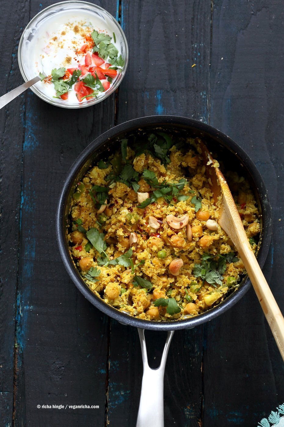 Chickpea Cauliflower Rice Biryani. 1 pot 30 Minute Meal with Veggies, Chickpeas, Spices, and Cauliflower Rice. Served with tomato raita. Vegan Gluten-free Soy-free Grain-free Recipe| VeganRicha.com
