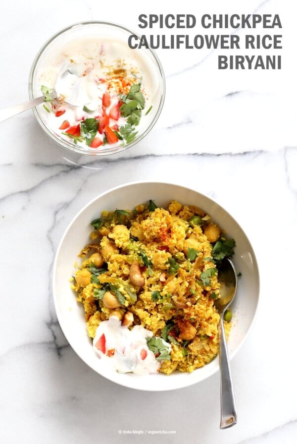 Chickpea Cauliflower Rice Biryani. 1 pot 30 Minute Meal with Veggies, Chickpeas, Spices, and Cauliflower Rice. Served with tomato raita. Vegan Gluten-free Soy-free Grain-free Recipe
