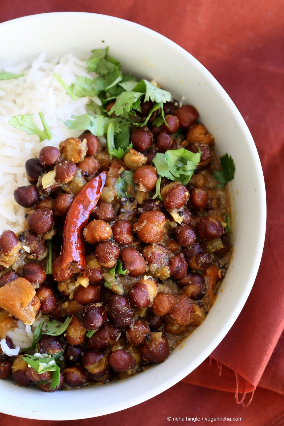 Kadala Curry - Bengal Gram or Kala Chana Curry with Coconut and Spices. Brown Chickpea Coconut Curry from South India (Kerala). Serve with rice, appams, dosas or make a bowl with roasted veggies and grains. Vegan Gluten-free Soy-free Indian Recipe | VeganRicha.com