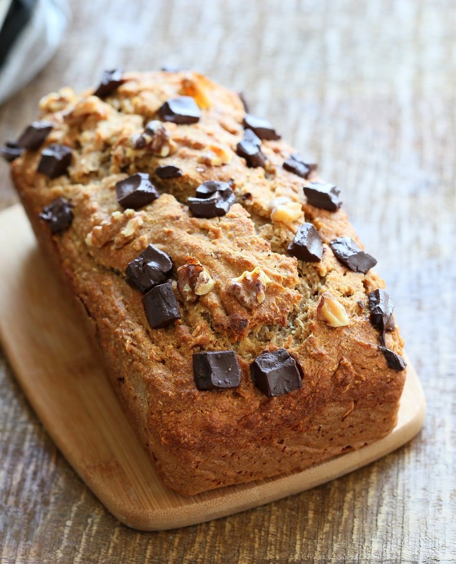 Vegan Banana Bread with Walnuts. Classic super moist Banana bread with toasted nuts and coconut. No Palm oil. #Vegan #Recipe #veganricha | VeganRicha.com.