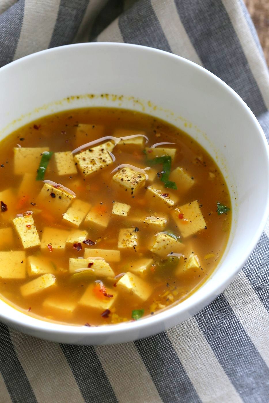 Turmeric Miso Soup With Ginger, Garlic and Tofu. Kick that cold with this soothing, anti inflammatory, brothy soup. Vegan Gluten-free Nut-free #vegan #Recipe #veganricha | VeganRicha.com