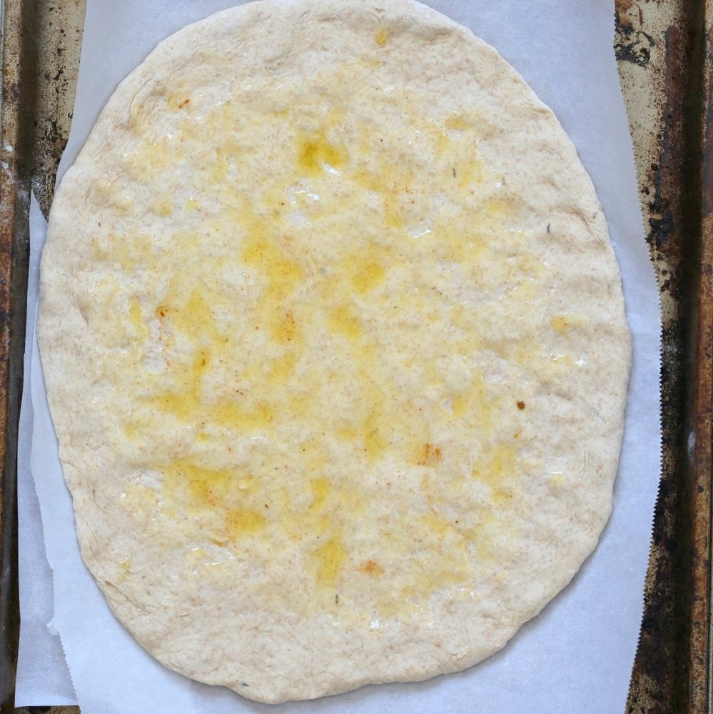Ethiopian Berbere Chickpea Pizza with Tahini Garlic Dressing. Amazingly flavorful pizza. Dress with tahini dressing, vegan ranch or other creamy dressing. Vegan Soyfree Nut-free Recipe. Gluten-free Crust option. | VeganRicha.com