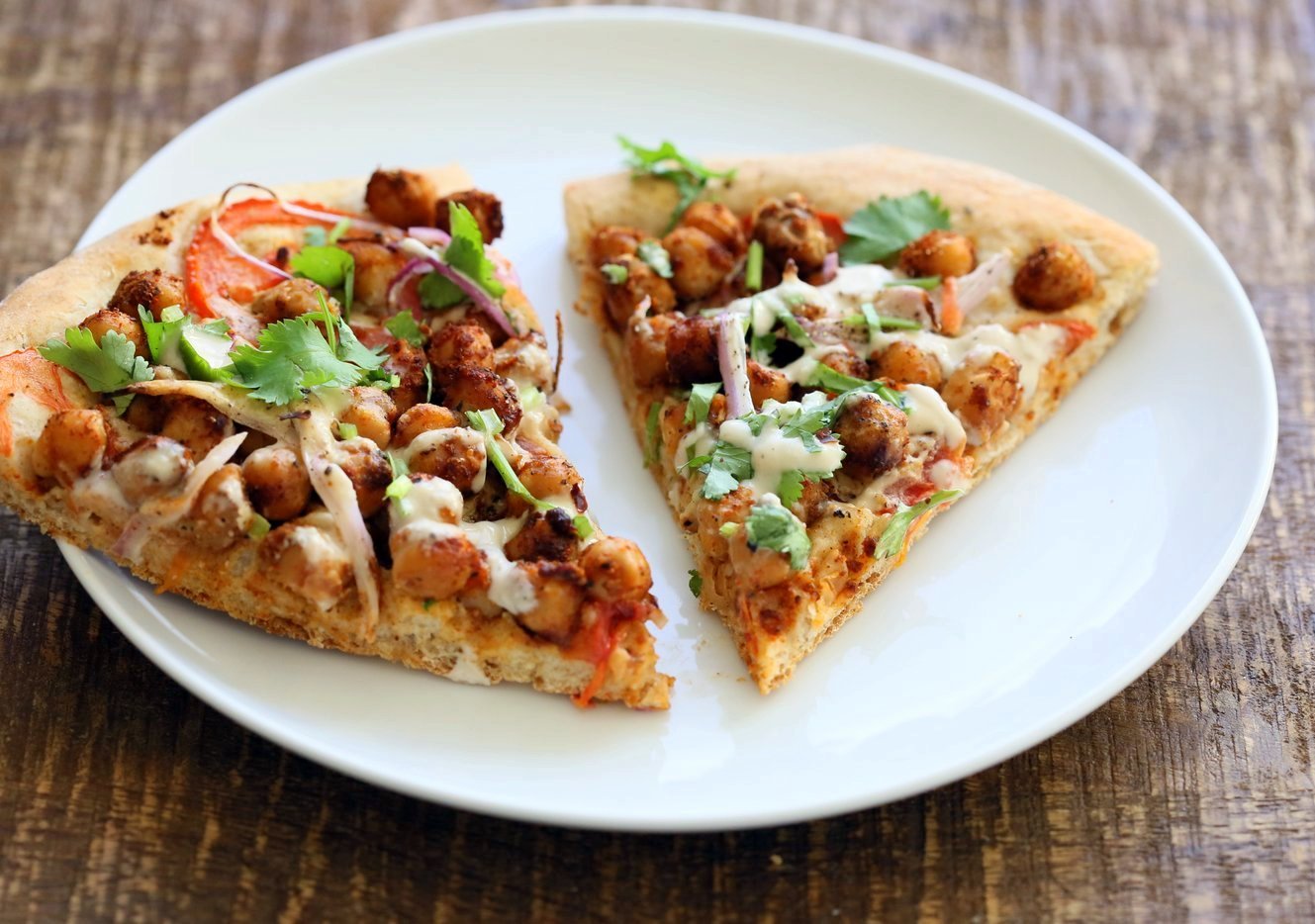 Ethiopian Berbere Chickpea Pizza with Tahini Garlic Dressing. Amazingly flavorful pizza. Dress with tahini dressing, vegan ranch or other creamy dressing. Vegan Soyfree Nut-free Recipe. Gluten-free Crust option. | VeganRicha.com