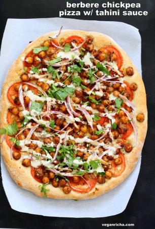 Ethiopian Berbere Chickpea Pizza with Tahini Garlic Dressing. Amazingly flavorful pizza. Dress with tahini dressing, vegan ranch or other creamy dressing. Vegan Soyfree Nut-free Recipe. Gluten-free Crust option. | VeganRicha.com