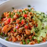 masala fried rice served with golden raita